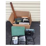 Two Foldable Drones, Binoculars, Books, and