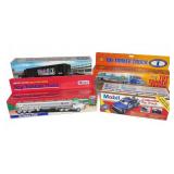 (4) Boxed Mobil Sunoco Toy Truck Set