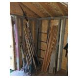 Garden Tools With Rakes And Saw