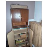Wood Cabinet With Gun Cleaning Supplies and Tools