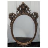 Ornate Oval Wall Mirror With Decorative Frame