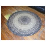 Round Braided Area Rug in Tan and Black