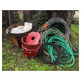 Garden Hoses, Wood Barrel, and Plastic Jugs