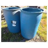 Two Blue 55-Gallon Plastic Open-Top Barrels