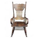 Carved Wood Spindle Back Rocking Armchair
