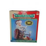 Telco Mrs. Santa at the Spinning Wheel Display