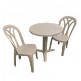 Tan Plastic Patio Table With Two Chairs Set