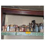 SHELF OF VINTAGE SPICE TINS & BOTTLES