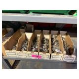 SHELF FULL OF STAINLESS HOSE CLAMPS