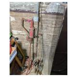 VINTAGE OIL DRUM PUMP AND 4 FISHING RODS/POLES
