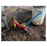 KIDS RIDING PUSH TRICYCLE
