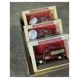 3 OLD FASHIONED METAL NUTCRACKER TRUCKS