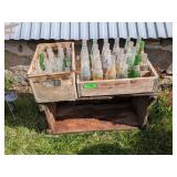 SODA CRATES WITH BOTTLES AND WOODEN CRATE