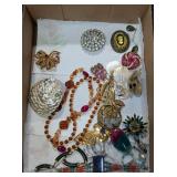 NECKLACES, BROACHES, AND EARRINGS