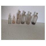 VINTAGE GLASS DR. PETERS MEDICINE BOTTLES