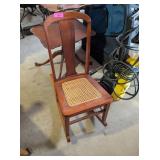 CHILD'S ROCKING CHAIR WITH WICKER SEAT