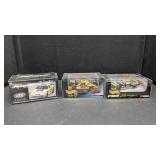 2 Hotwheels NASCAR Caterpiller Race Cars, 1 Ertl