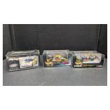 2 Hotwheels NASCAR Caterpiller Race Cars, 1 Ertl