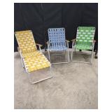 Two Woven Outdoor Chairs and Chaise Lounge