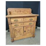Ornate Wooden Sideboard With Decorative Carving