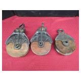 Three Iron and Wood Pulleys