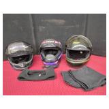 Three Snowmobile Helmets and Accessories