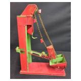TIN TOY ELEVATOR WITH CHAIN AND BUCKET