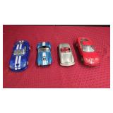 FOUR DIE-CAST MODEL CARS