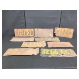8 NY LICENSE PLATES AND WOODEN BATTERY