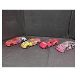FOUR RACING CHAMPIONS DIE-CAST CARS