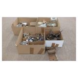 BOXES OF MIXED METAL DOOR HARDWARE LOT