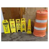 SAFETY SIGNS AND ORANGE TRAFFIC BARREL