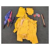 YELLOW RAIN SUITS, UMBRELLAS, FLY SWATTERS