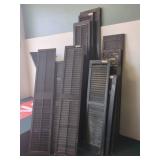 LARGE QUANTITY BLACK LOUVERED EXTERIOR SHUTTERS