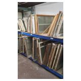APPROXIMATELY 82 WOODEN AND GLASS WINDOW SASHES