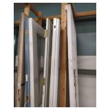 FIVE ASSORTED EXTERIOR WOOD AND GLASS DOORS