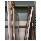 FIVE METAL STORM DOORS ASSORTED SIZES & STYLES