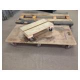THREE WOOD DOLLIES WITH CASTERS