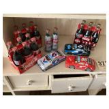 Coca-Cola lot with bottles and tin and