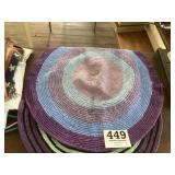 Two. Handmade throw rugs.