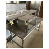 Industrial kitchen table with raised