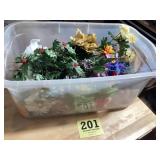 Tote lot full of new artificial flowers