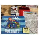 A lot of new holiday items cards, Christmas bags,