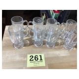 Set of eight clear glass coffee cups from