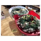 Two Christmas wreath plus the  plastic storage