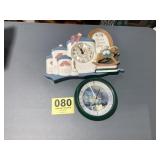 Two battery operated wall clocks