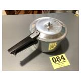 Mirror, pressure cooker