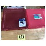 Two plastic scrapbooking supply cases