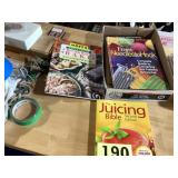 Flat of cookbooks and crocheting book