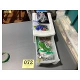 Small one drawer, plastic storage container, full
